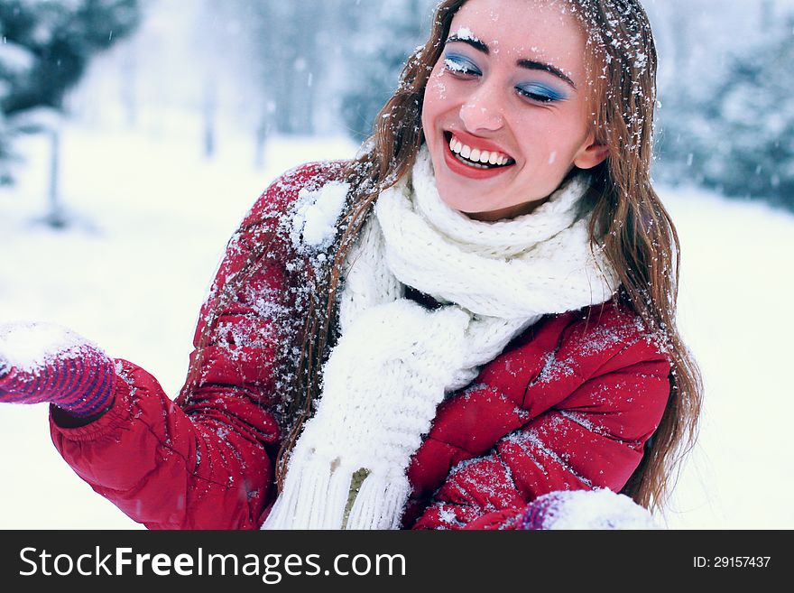Outdoor sensual portrait of pretty young woman in winter park. Outdoor sensual portrait of pretty young woman in winter park