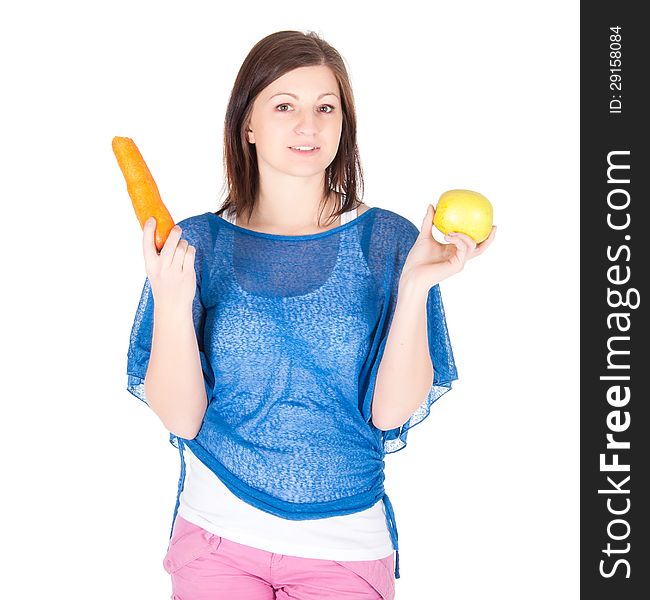 Young Woman Chose Between Apple And Carrot Over White Background