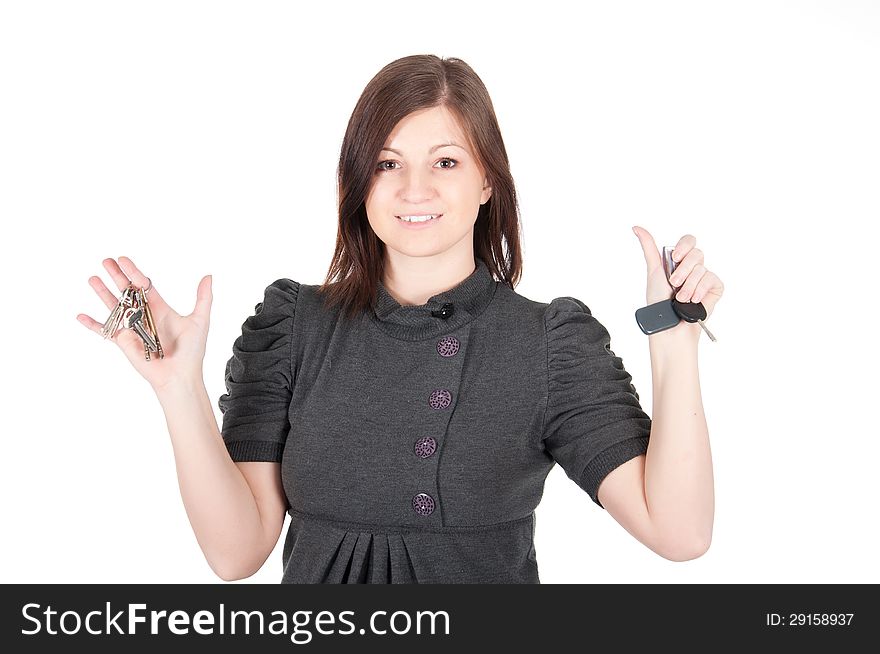 Young Beautiful Woman Showing Apartment Keys On White Background