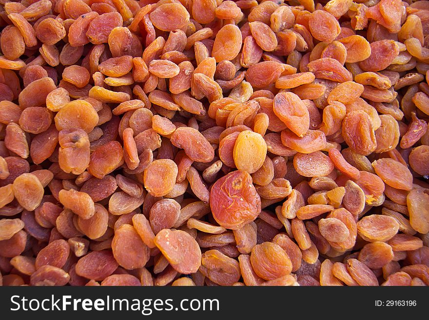 Dried apricots on a market stand