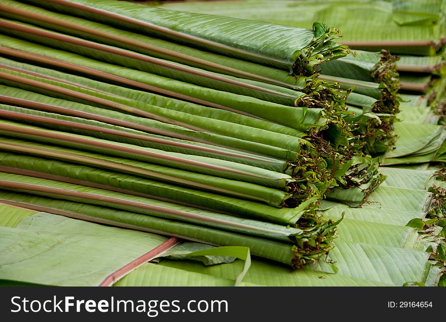 Stock of banana leaves on a market