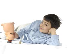 Piggy Bank And Child Royalty Free Stock Photos