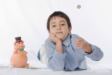 Piggy Bank And Child Royalty Free Stock Photos