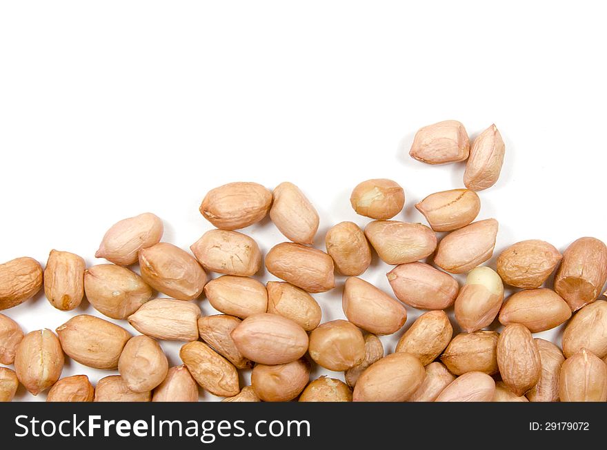 Raw peanuts isolated on white background