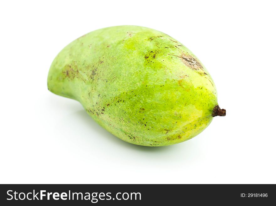 Green mango on a white background. Green mango on a white background.