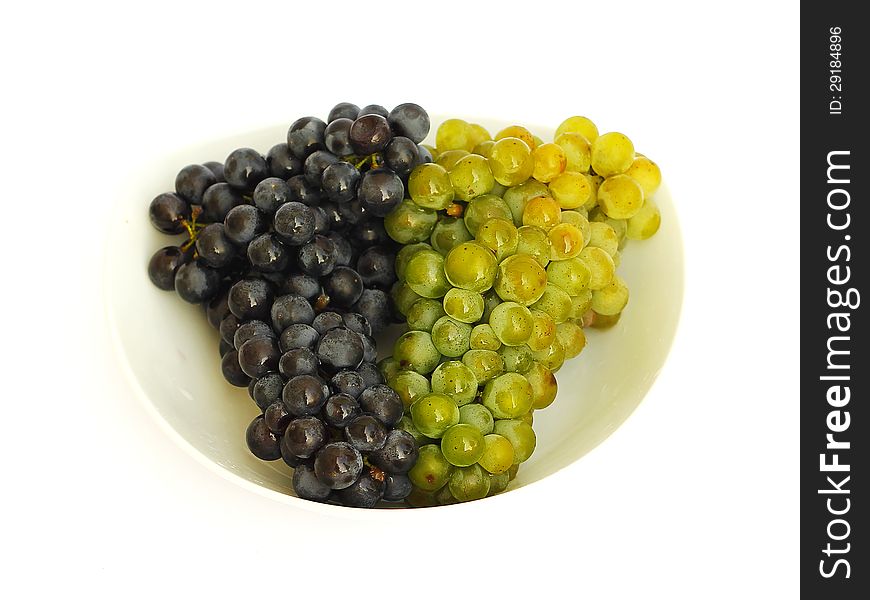 Fresh grapes on a white background