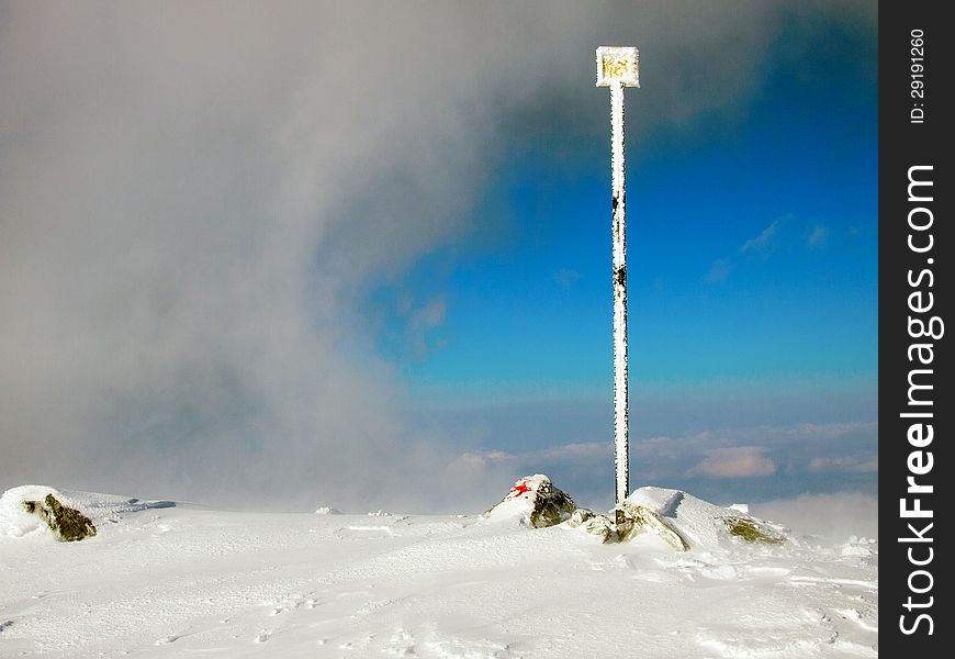 Frozen trail post high on a mountain ridge in the Fagaras mountains (Southern Carpathians, Romania)