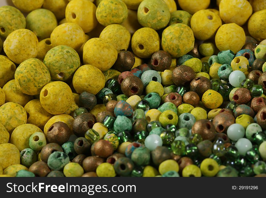 Mixed clay and glass beads collection.