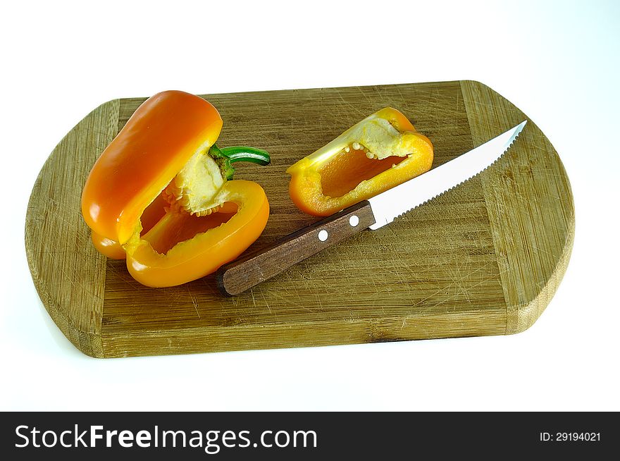 Yellow pepper on cutting board