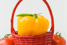 Red Basket With Yellow Pepper Royalty Free Stock Photos