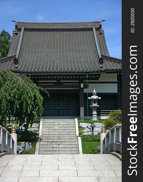 Traditional japanese temple viewed from a bridge