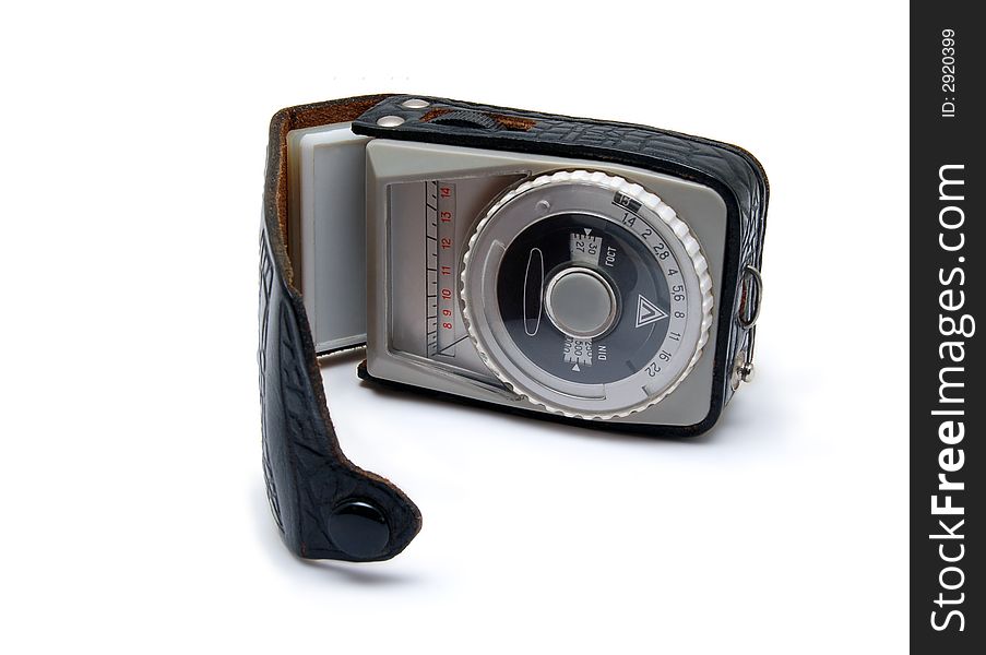 Vintage light meter isolated on a white background