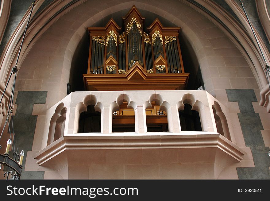 Church organ pipes up close in details.