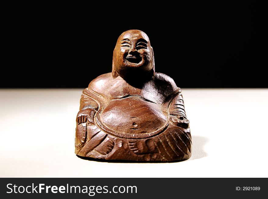 Photo of figurine of sitting Buddha