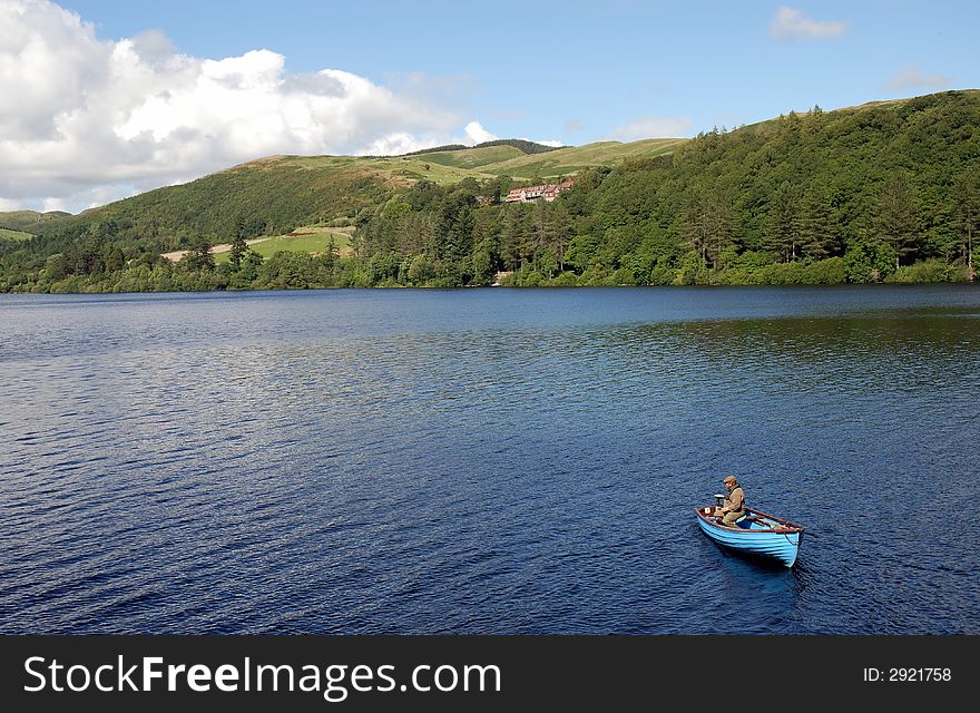 A fisherman on Lake Vyrnwy in North Wales. A fisherman on Lake Vyrnwy in North Wales.