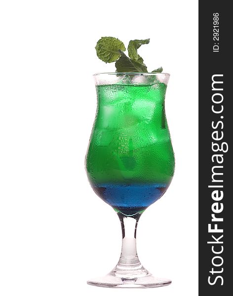 Colorful alcoholic cocktail in a glass against white background. Colorful alcoholic cocktail in a glass against white background