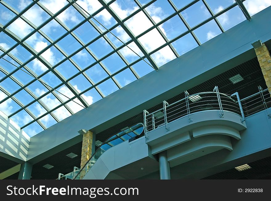 Modern trade centre with a sky reflection