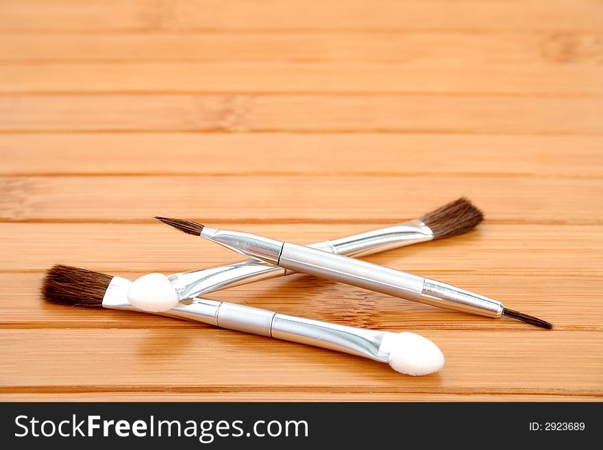 Makeup brushes on wood