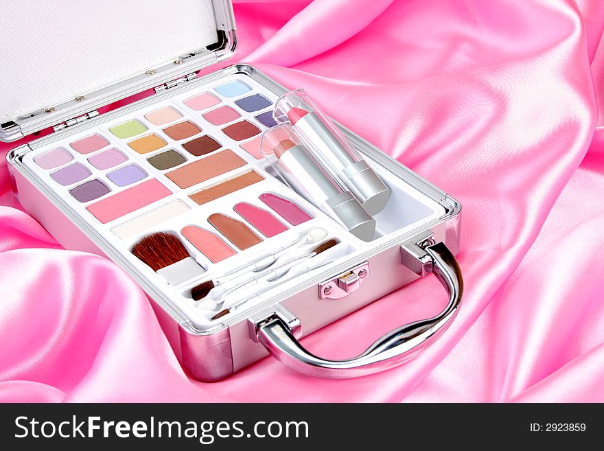 Makeup briefcase on pink satin 2