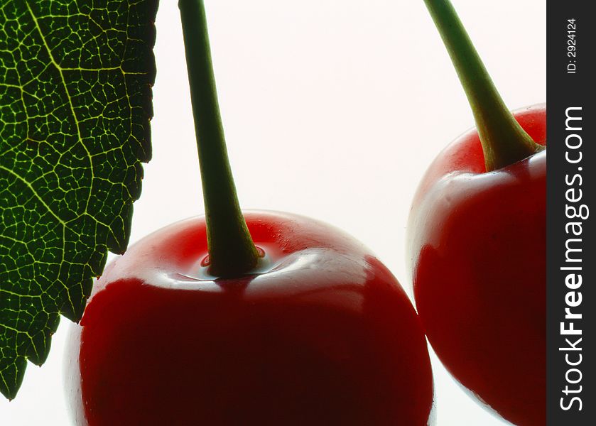 Red cherry costing on a white background