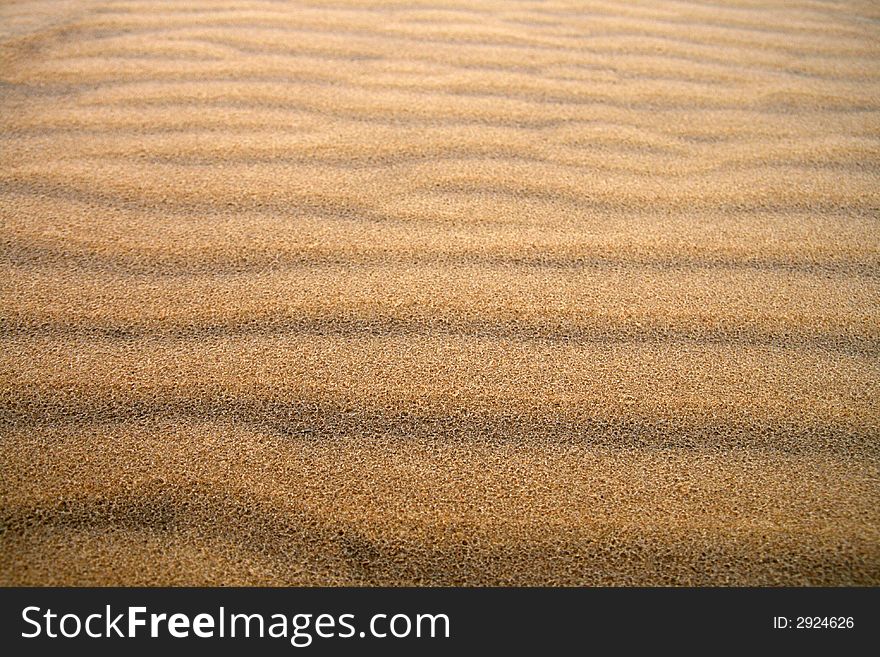 Dune sand texture, 
dark, gold sand