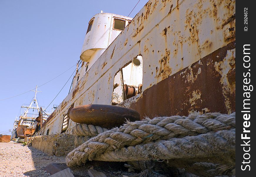 Detail of one rusty old ship in dock