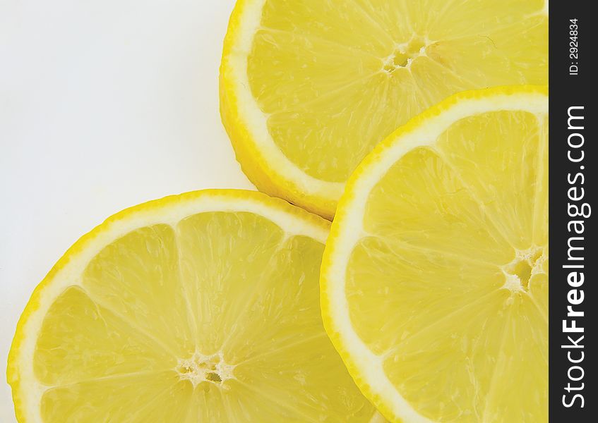 Slices of lemon isolated on white background