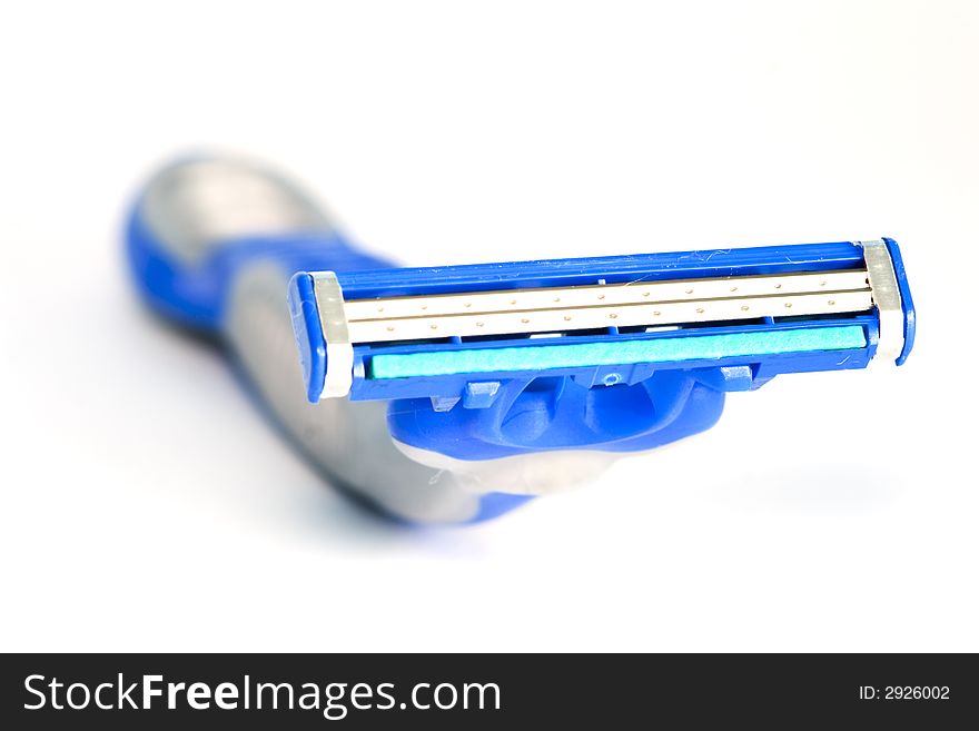 Blue safety razor isolated over white background
