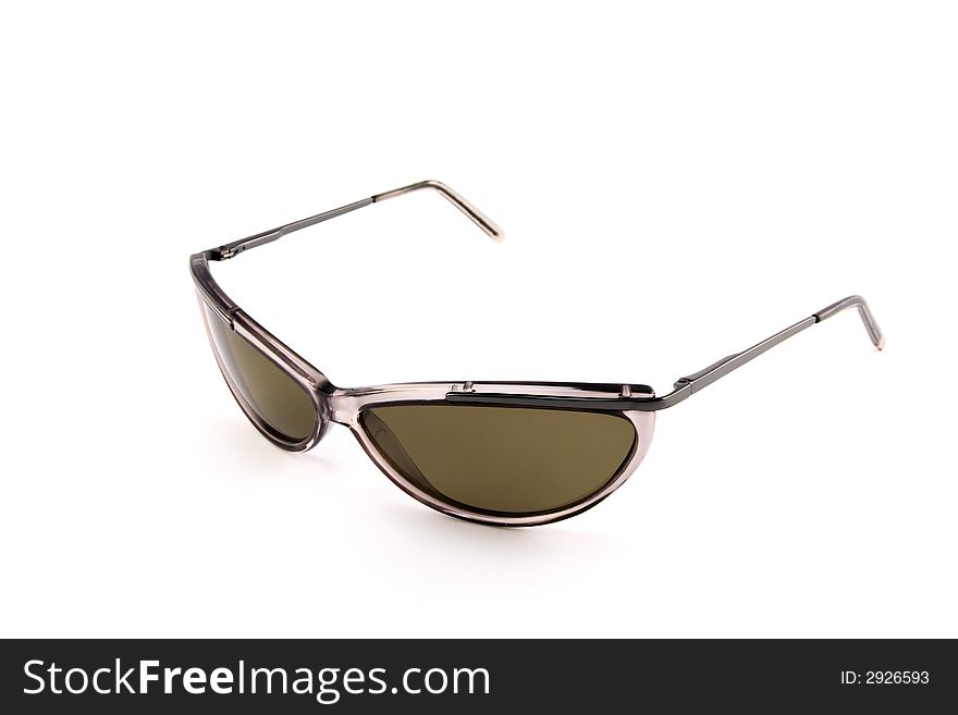 Brown stylish sunglasses isolated on white background, side view. Brown stylish sunglasses isolated on white background, side view.