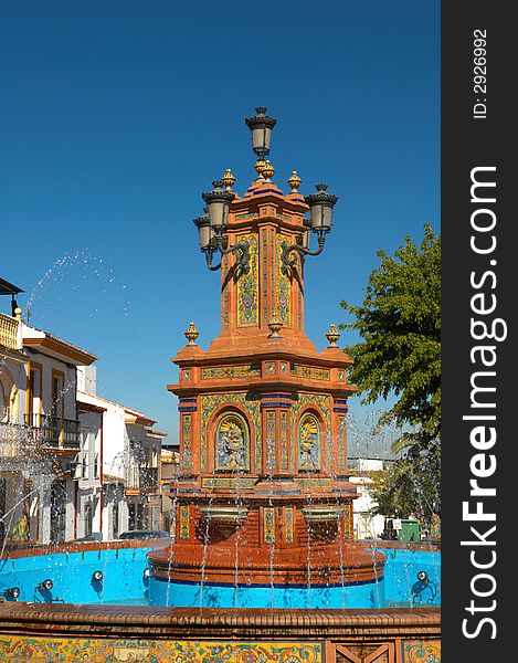 Traditional city fountain in small spanish style