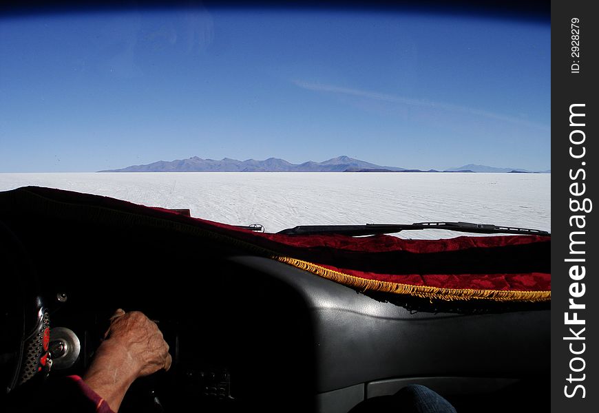 The inside of a truck driving across salt plains in Uyuni in Bolivia.