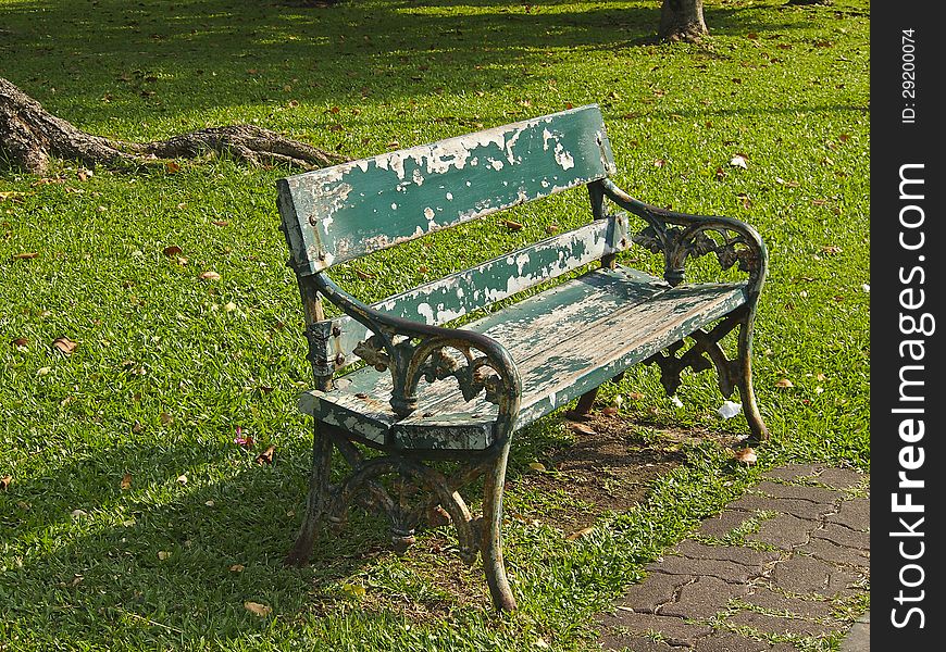 Old green empty bench in pubic park. Old green empty bench in pubic park