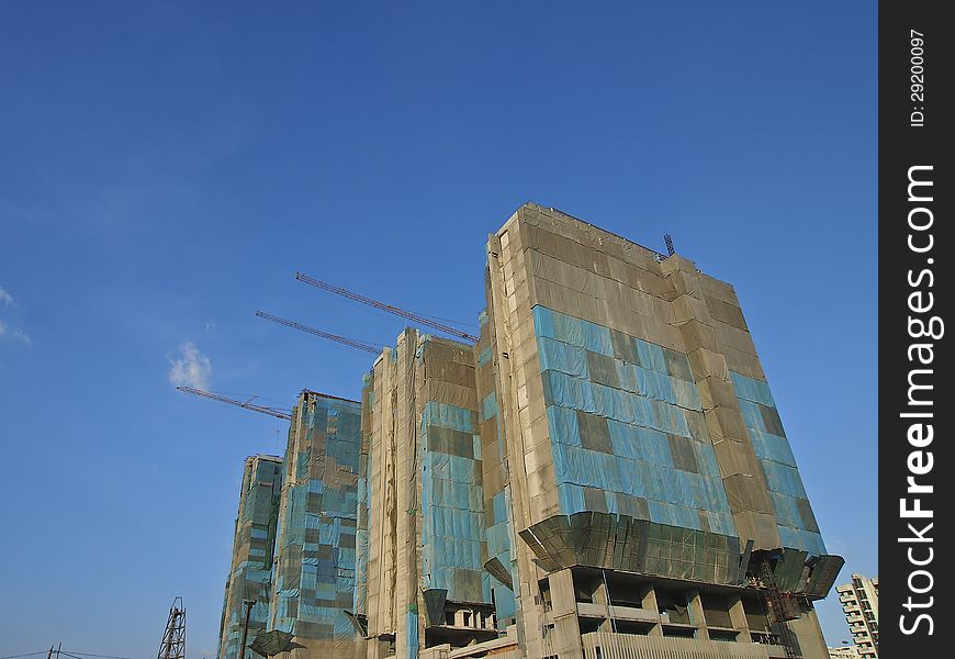 Construction of arrange high building in sunny day. Construction of arrange high building in sunny day