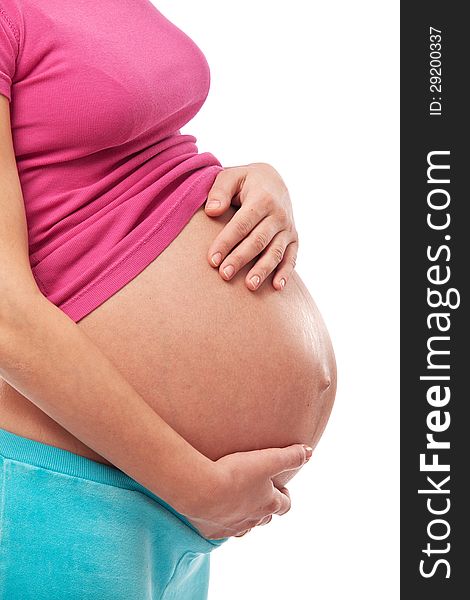 Pregnant woman keeping hands on her belly