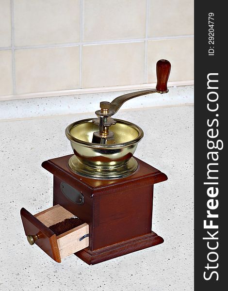 Vintage coffee grinder on the kitchen table