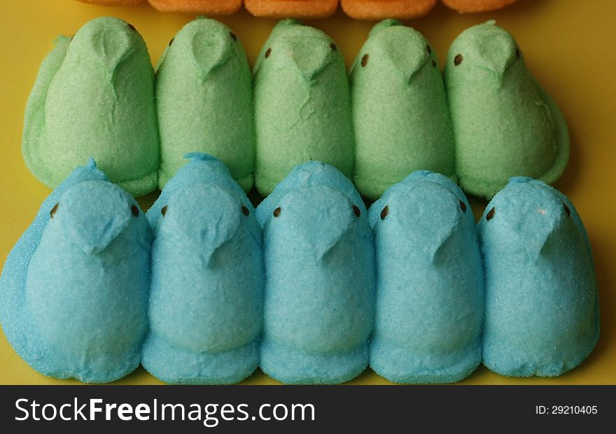 Easter peeps blue and green in row. Easter peeps blue and green in row