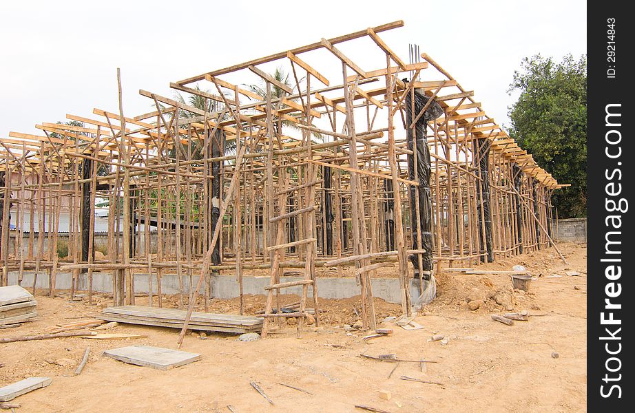 House under construction with the structure of wood