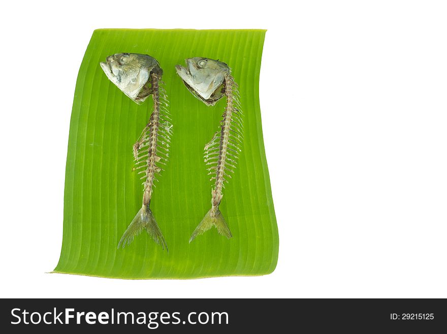 Mackerel fishes on banana leaf fishes bone on banana leaf. Mackerel fishes on banana leaf fishes bone on banana leaf