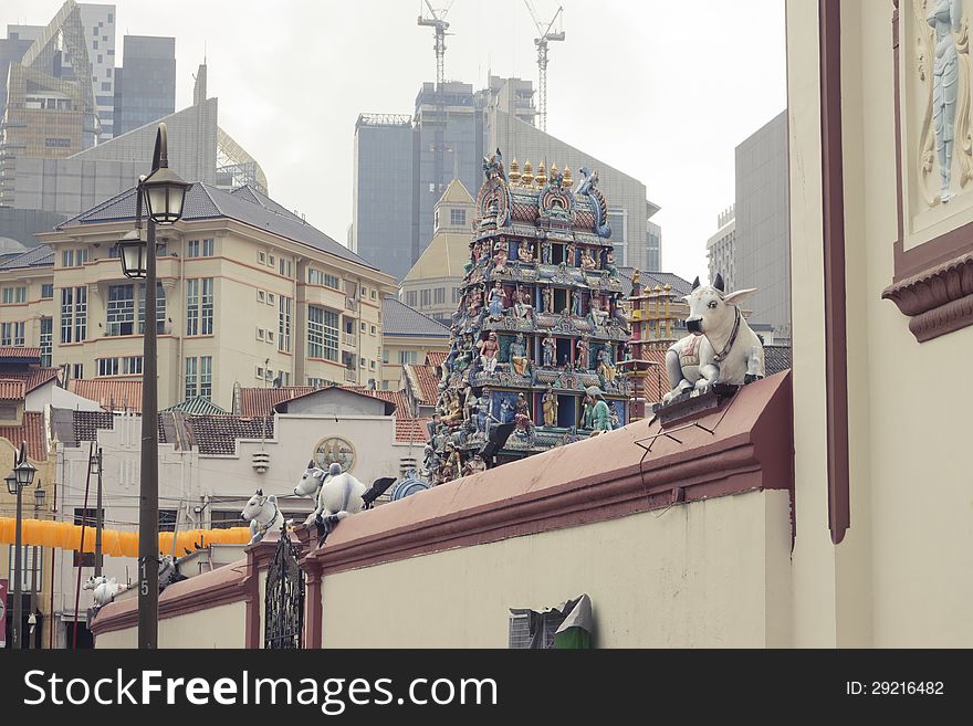 Singapore Chinatown architecture with famous Sri Mariamman Hindu Temple wall on foreground