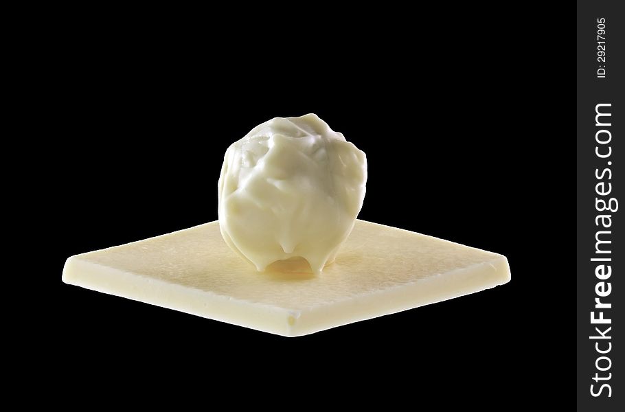 White chocolate isolated on a black background
