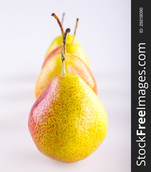 Ripe pears  on white background