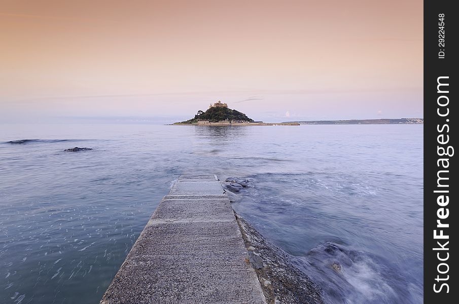 Image taken in Marazion, Cornwall, 2009. The idea behind this image is to lead the viewers eye towards the Mount by following the lines of the causeway. A long exposure was used to create movement of the waves. Image taken in Marazion, Cornwall, 2009. The idea behind this image is to lead the viewers eye towards the Mount by following the lines of the causeway. A long exposure was used to create movement of the waves.