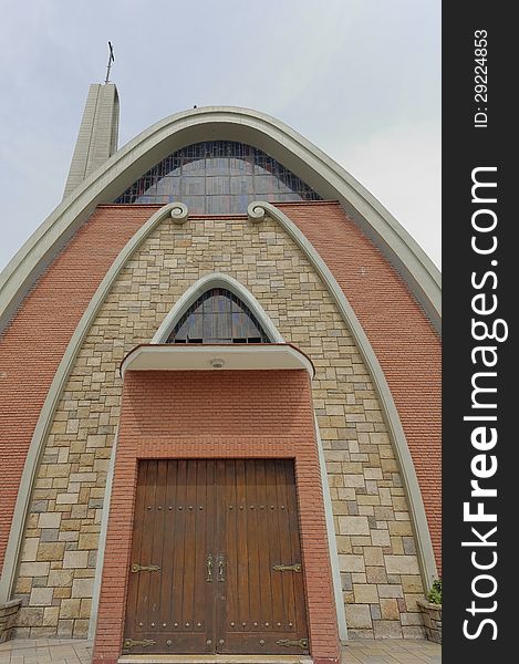 Image taken in in Miraflores, Lima, Peru 2010. The idea has been to accentuate the rounded shape of the church entrance using a wide angle lens. Image taken in in Miraflores, Lima, Peru 2010. The idea has been to accentuate the rounded shape of the church entrance using a wide angle lens.