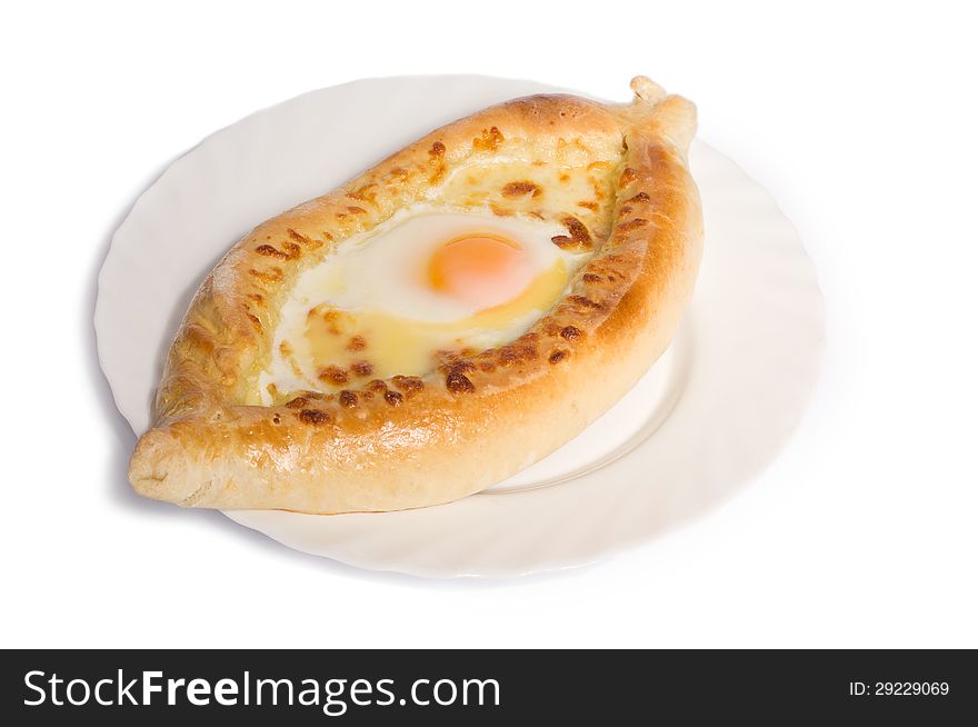 Egg in khachapuri bakery on white. Egg in khachapuri bakery on white