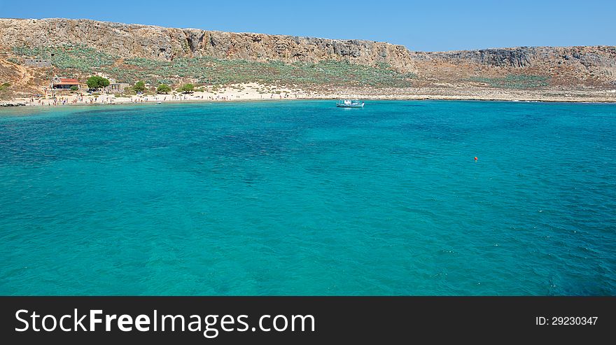 On the shore of the island Gramvousa sandy beaches. Seen off the coast of a small white boat.