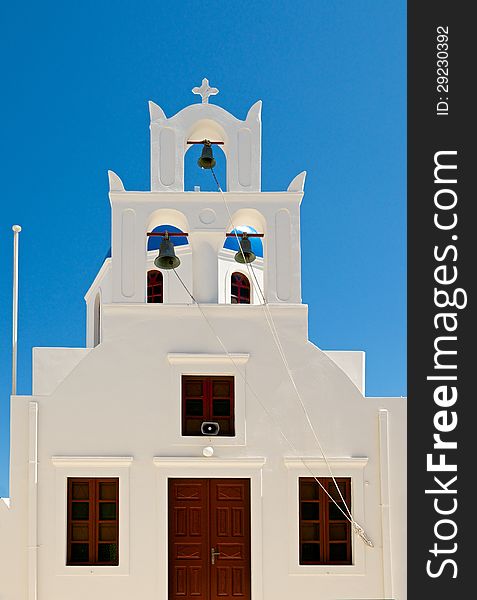 The beauty of Greek architecture is particularly visible in the church buildings. White arches of the church bell tower, reminiscent of delicate lace. The beauty of Greek architecture is particularly visible in the church buildings. White arches of the church bell tower, reminiscent of delicate lace.