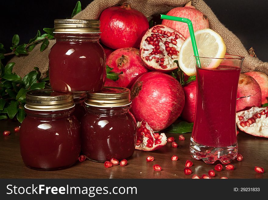 Fresh ripe pomegranate and juice in the glass. Fresh ripe pomegranate and juice in the glass