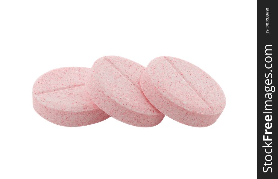 Close up of three rose pills on white background. Clipping path included.