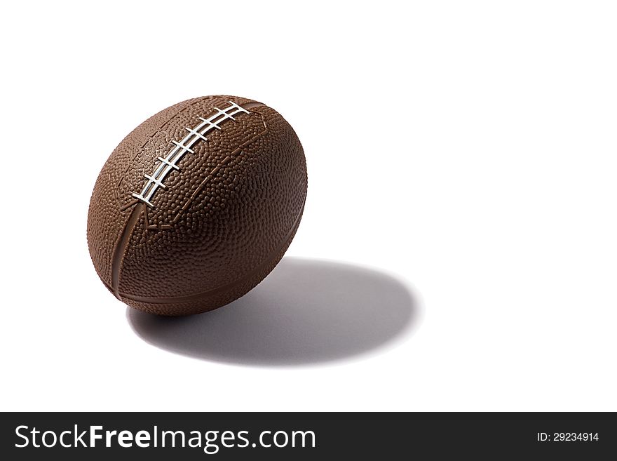 Football on white background with dark shadow