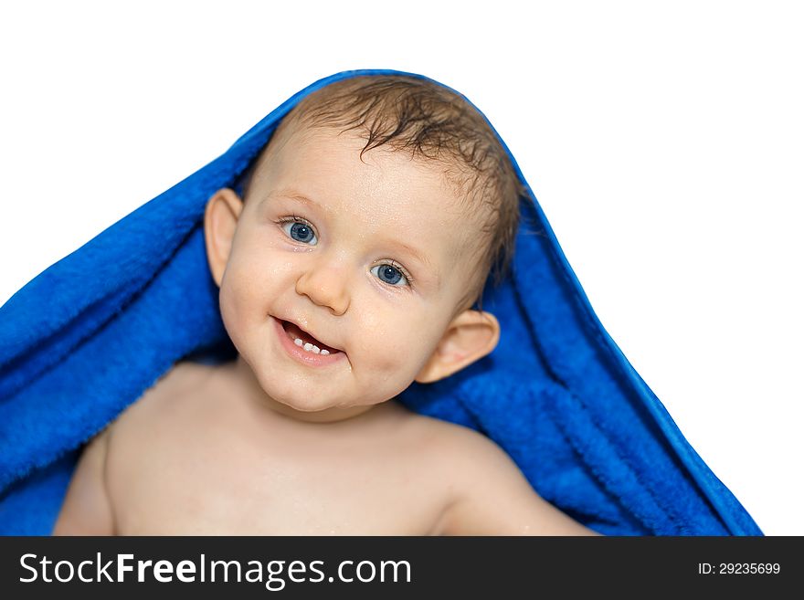 Happy baby in a towel